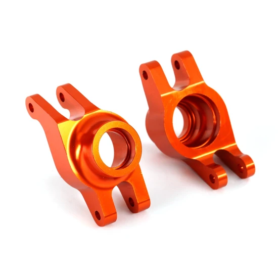 Oranje aluminium stub axle carriers (L&R)
