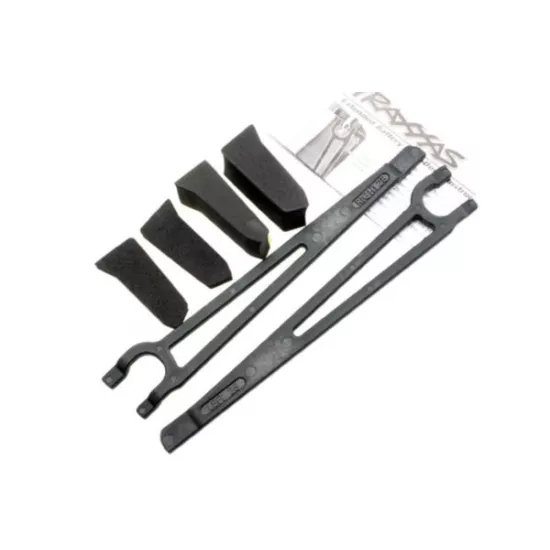 Hold downs, battery, left & right (2)/ foam spacers (4) (all