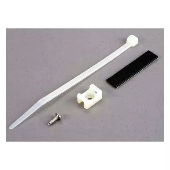Attachment bracket, plug/ foam tape/tie wrap/ 3x10mm wst scr, TRX4577