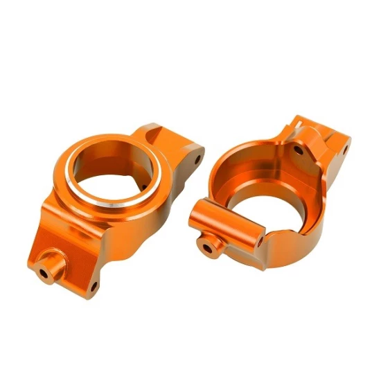 Caster blocks (c-hubs), 6061-T6 aluminum (orange-anodized), left & right