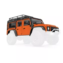 Body, Land Rover Defender, complete, orange (includes grille, side mirrors, door handles, fender flares, fuel canisters, jack, spare tire mount, & clipless mounting) (requires #9734 front & rear bumpers)